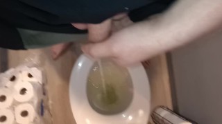 Frat boy takes a standing piss