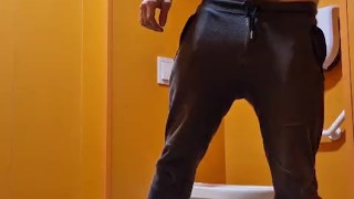 Horny boy can't wait any longer and squirts his milk all over his hot body in public toilet