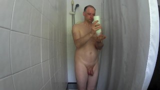 Kudoslong showers his uncut cock is small and flaccid he washes, towels down and gets dressed