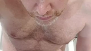Daddy jerks off his thick uncut British cock.