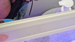Stroking my cock in the airplane toilet. I couldn't resist!