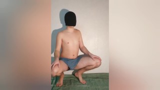 A guy shows what a chastity belt looks like in his underpants - a chastity cage in a boxers