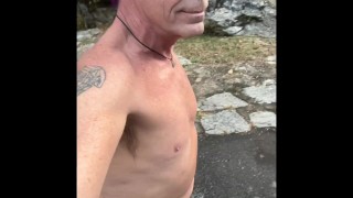 Exhibitionist walks from car naked into bathroom and cums on his feet.