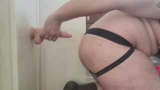 Riding a dildo