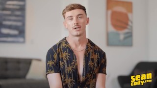 SEAN CODY - Phoenix Sheds His Clothes And Strokes His Long Curved Cock Until He Cums On The Bed