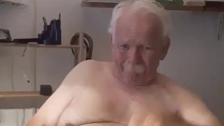 Old man straps his cock and balls to order