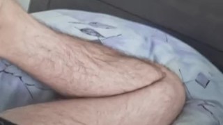 Licking own armit and rubbing foot