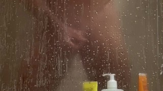 Hot sexy muscular guy showering and masturbating in the shower cum