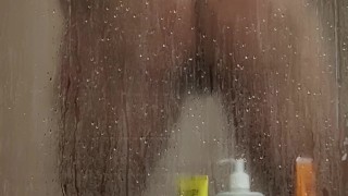 Hot sexy muscular guy showering and masturbating in the shower cum