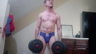Handsome white latino working out in jockstrap