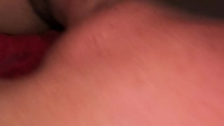 Rimming a blokes ass as he lays in the sling at a sex club