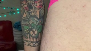 Cute Butch in harness with a glass dildo