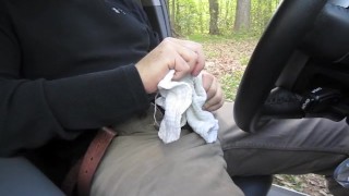 Horny so I pull the car over and jerk-off in a parking lot. I cum, get out and pull up my pants