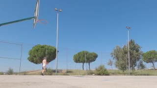 Sweaty basketball in tight singlet on public field