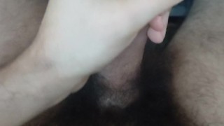 Hot loud moaning guy jerking his hairy uncut cock