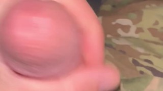 Army soldier shows his musky size 12 feet while jerking his hard cock in uniform