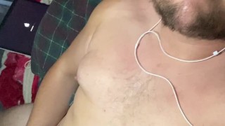 Cute young chubby bear shoots his load