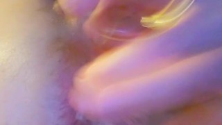 Anal masturbation with a glass dildo, lots of hot cream