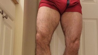 Hairy muscle bear flexing in red boxer briefs