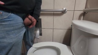 Pissing with huge balls hanging