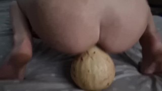 riding a huge pumpkin cowgirl