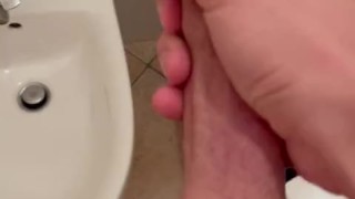 My uncut cock explode while I’m jerking in my friend’s bathroom