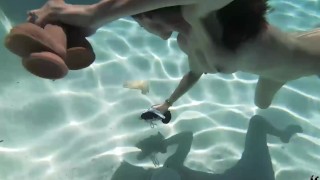 Brunette MILF Sofie Marie Dives In Pool To Play With Dildos