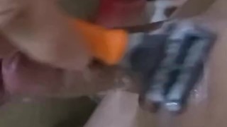 Watching my husband shave his big cock