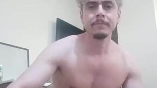 Handsome stud flexing and working out naked