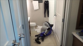 commando wearing bastard wetsuit wrestles speedo dummy