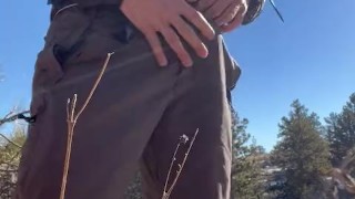 Young guy edges cock on hiking trail