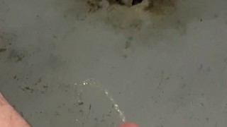 Pissing on the floor while sitting