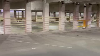 Twink jerks off in parking garage and blows load