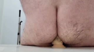 Bisexual Daddy Rides Dildo in Bathroom