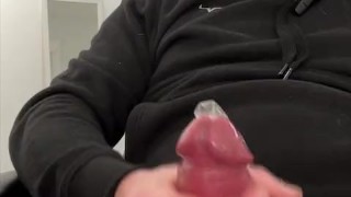 Jacking off into a condom.