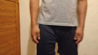 Man in diapers puts on anal plug with chastity lock