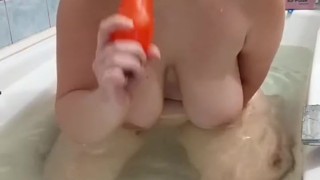 Russian beauty relaxes in the bath