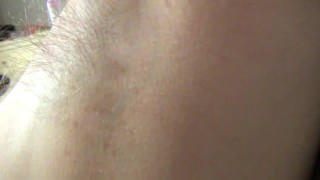 Blonde hairy armpit hair showing in armchair