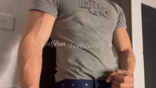 Colombian stallion shows his huge biceps and ends up caressing his penis