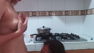 I fuck my girlfriend's pussy with my strap-on and then she sucks my dildo in the kitchen