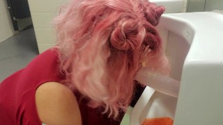 Sucking a dildo inside a Public Urinal!