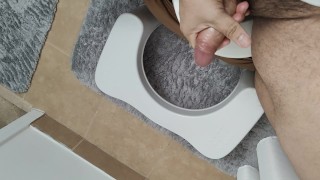 Horny stroking my dick in the bathroom