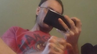 Smoking and masturbating huge cock with spit.