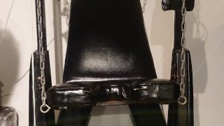 latex dragon bound on swing chair