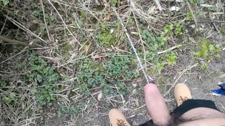 Long piss in slow motion from uncut hairy cock outdoor