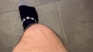 German soccer player showing off all black soccer socks