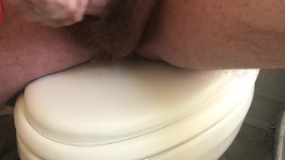 Masturbating in the bathroom on the toilet
