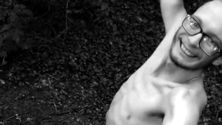 Slender man running around the forest completely naked black and white video