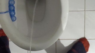 Big Cut Cock Takes a Piss at Toilet