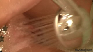 Emo Emily Rubbing shower on her pussy